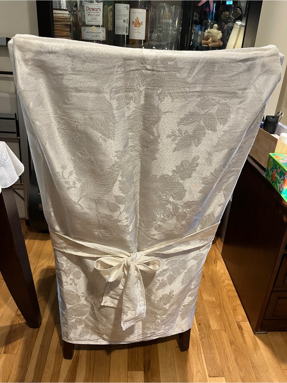 Ivory dining chair covers with bow on back. Harvest leaves pattern. NWT. 4 avail